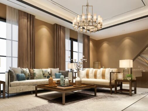 Salon z wiszącym żyrandolem na środku sufitu.